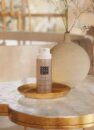 Сухий шампунь Rituals Elixir Dry Shampoo 50 мл на золотій таці на мармуровому столику