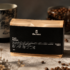 Кава мелена Brazil Santos (Black Edition) 250 г: пачка з чорною етикеткою the box серед кавових зерен
