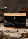 Кава мелена Brazil Santos (Black Edition) 250 г: пачка з чорною етикеткою the box серед кавових зерен