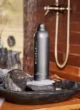 Гель-піна для душу Rituals The Ritual Of Homme 200 мл: сірий балончик на кам'яній чаші біля душу