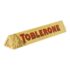 Швейцарський молочний шоколад TOBLERONE з медом та нугою 100 г у жовтій трикутній упаковці
