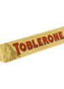 Швейцарський молочний шоколад TOBLERONE з медом та нугою 100 г у жовтій трикутній упаковці