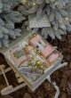 Бокс JINGLE BELLS: коробка з лускунчиком і тарілочкою-ялинкою на санчатах, листівка на гілці ялинки