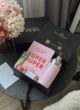 Бокс SPRING VIBE: відкрита коробка на темному столику біля гортензій