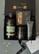 Бокс MIDNIGHT CARE: відкрита коробка зверху з листівкою Best wishes на сірому тлі