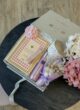 Бокс THANKFUL: відкрита коробка на темному столі поруч із гортензіями