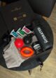 Бокс FITNESS BOX: відкрита коробка з фітнес-набором на круглому чорному столику