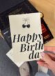 CHERRY LADY: рука тримає листівку Happy Birthday з вишеньками та бантиком
