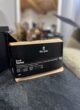 Бокс WORK-LIFE: пачка кави the box Brazil Santos у чорній упаковці на темному столі
