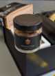 Бокс JUST BECAUSE: баночка горіхів Assorted Nuts на тлі відкритої чорної коробки
