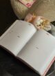 Бокс SELF LOVE KIT: розгорнутий планер із тижневим розворотом, поруч букет сухоцвітів із бавовною