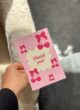 Бокс SELF LOVE KIT: рожева листівка «Thank you!» з вишнями та бантиками в руці