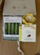CALM & CARE згори: набір Baylis & Harding Wellness, свічка у формі квітки, блиск Lipss і шоколад Lviv Handmade