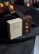 CHERRY LADY: коробка шоколадних цукерок Lviv Handmade Chocolate на темному столі