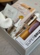 Бокс SOFT LUXE: крупним планом щітка Superbrush, маска Centella, свічка-мушля та засоби Rituals