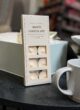 Бокс ME TIME: набір чайних свічок White Chocolate поруч із чашкою