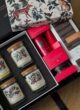 Бокс RITUAL: свічки, набір Rituals і шоколад Caramel & Salt у відкритій коробці зверху